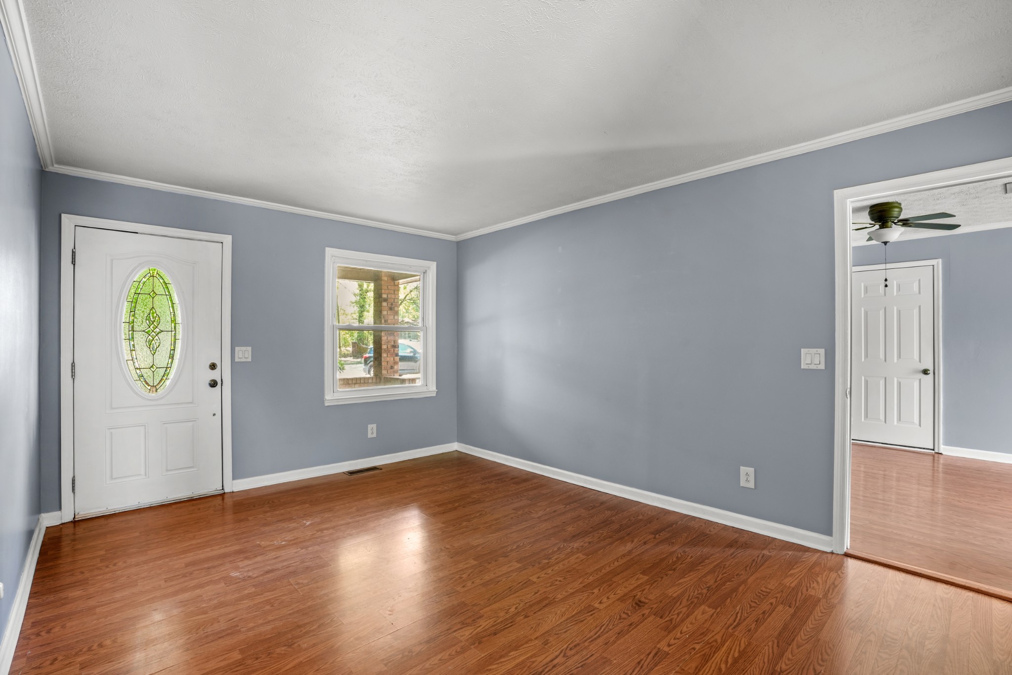 1106 State Highway 48 Dickson, TN 37055 - Photo 12 of 36 an empty room with windows and wooden door