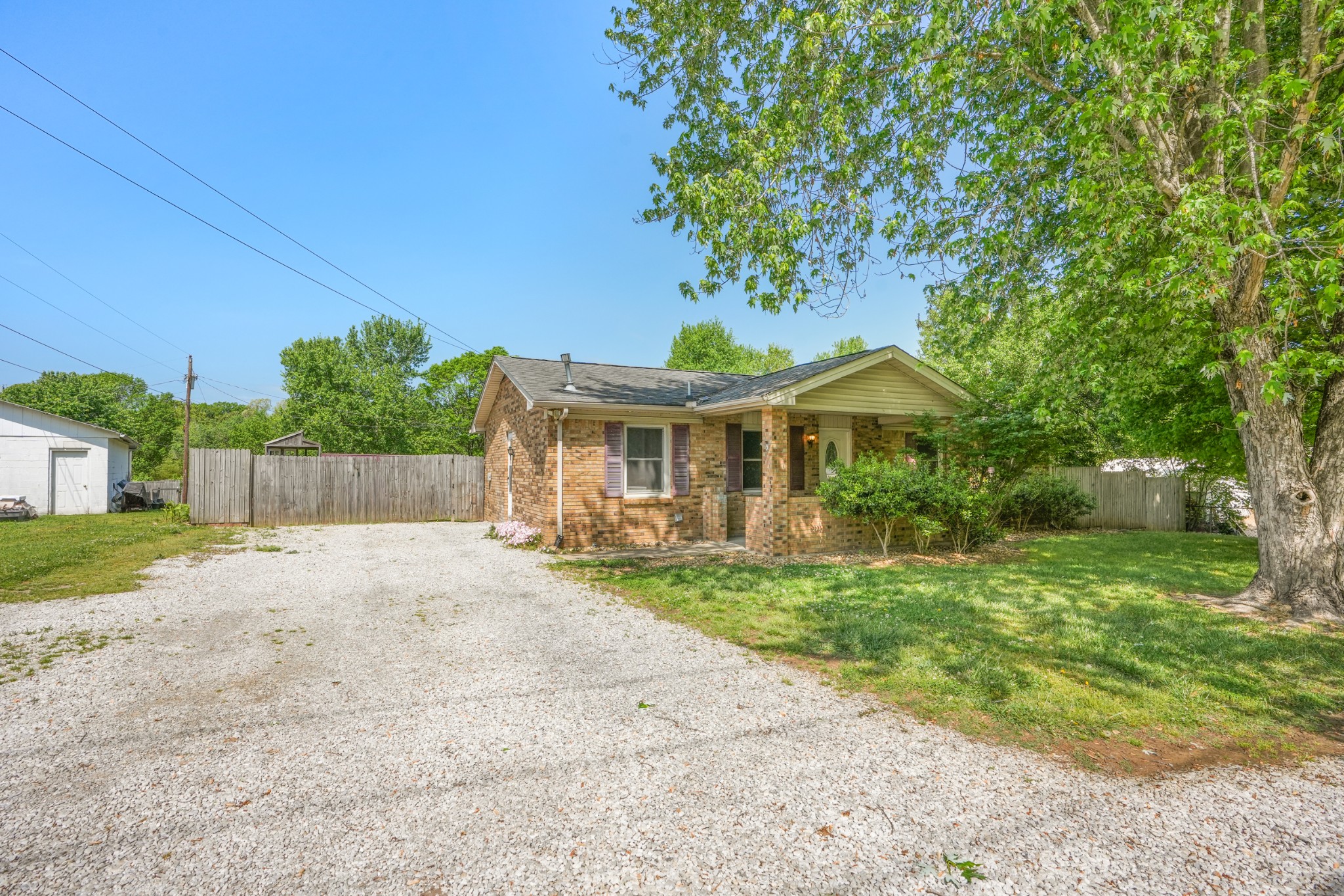 1106 State Highway 48 Dickson, TN 37055 - Photo 2 of 36 a front view of a house with garden