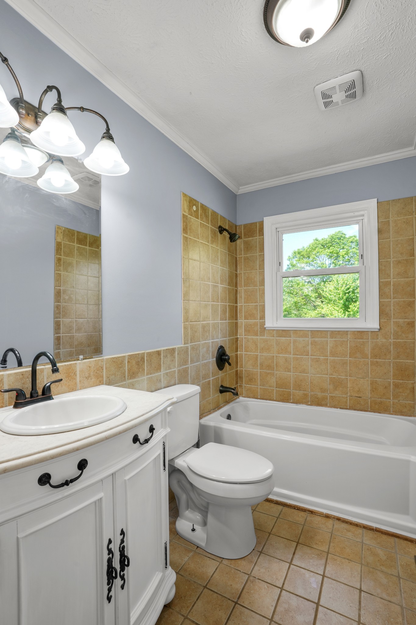 1106 State Highway 48 Dickson, TN 37055 - Photo 23 of 36 a bathroom with a sink a toilet and a bathtub