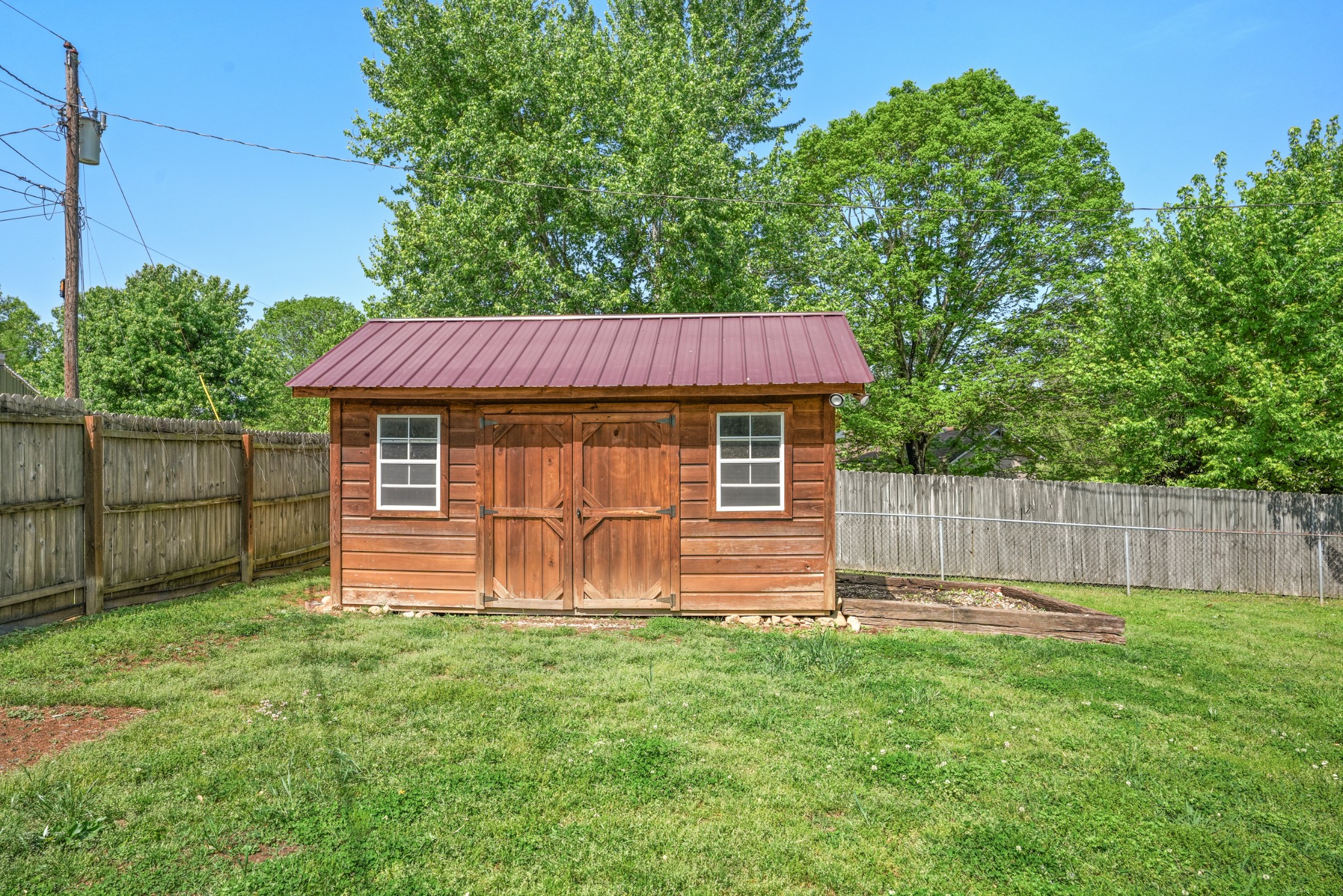 1106 State Highway 48 Dickson, TN 37055 - Photo 29 of 36 a view of a backyard with a garden
