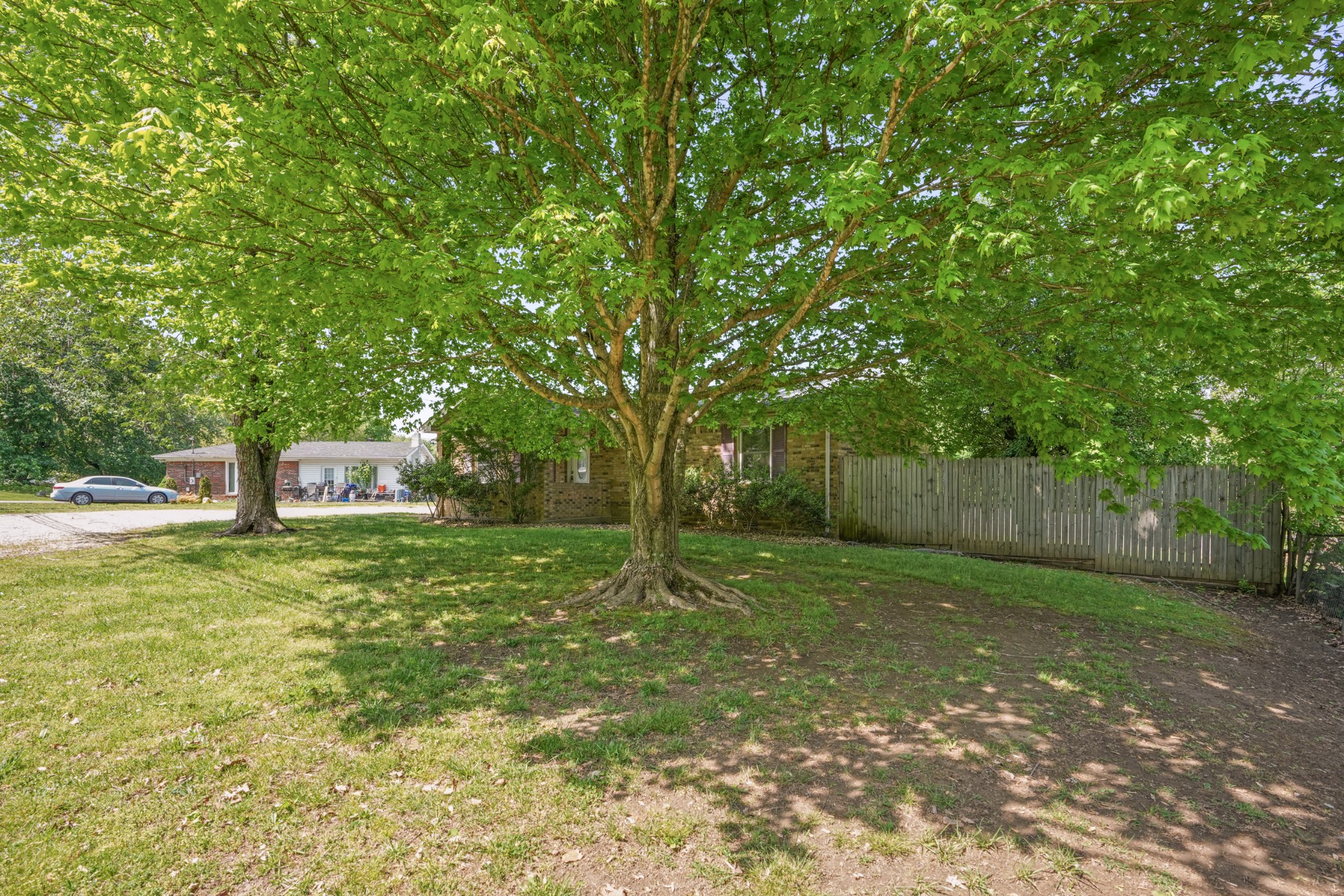 1106 State Highway 48 Dickson, TN 37055 - Photo 4 of 36 a house with a tree in front of it