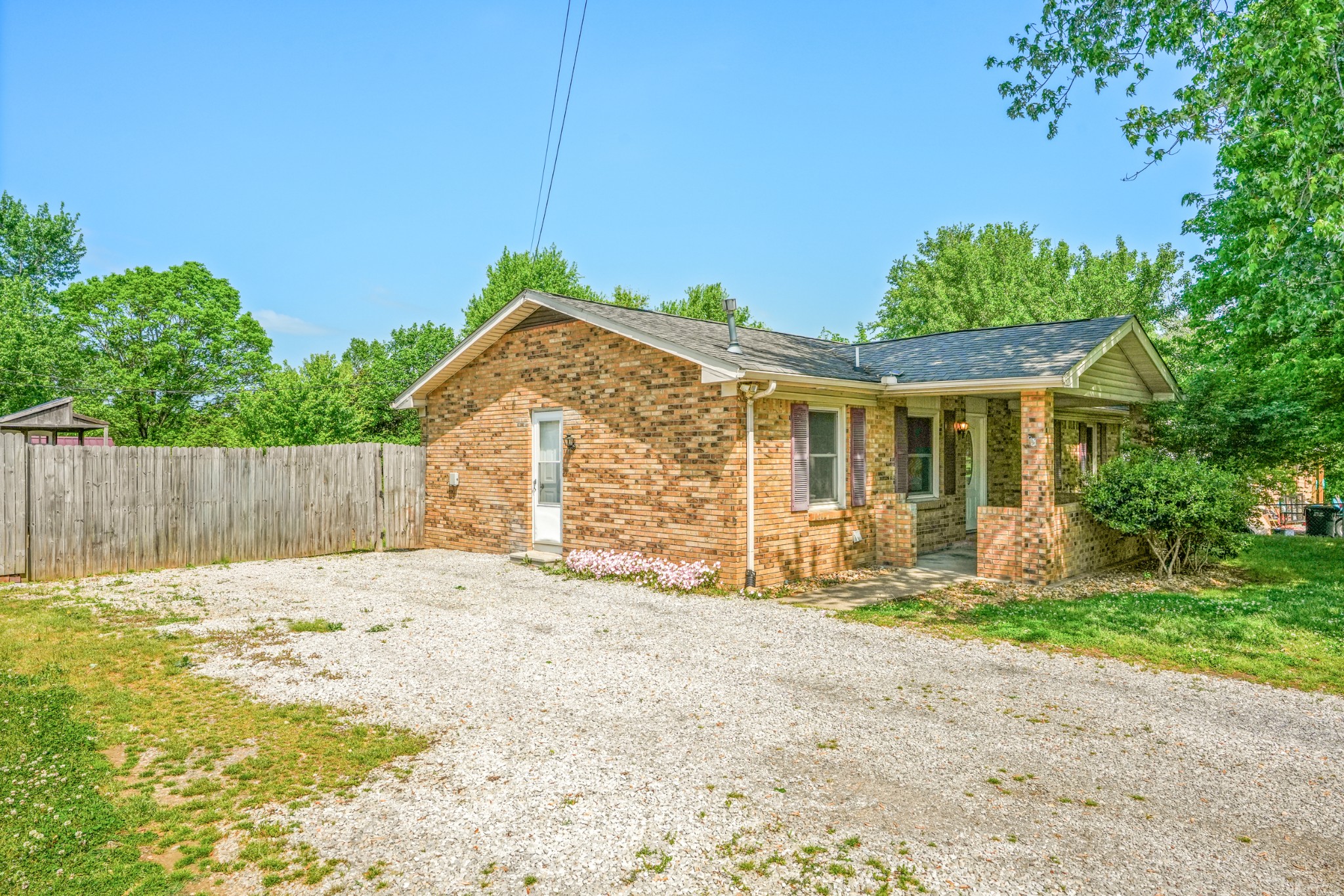 1106 State Highway 48 Dickson, TN 37055 - Photo 6 of 36 a front view of a house with a yard