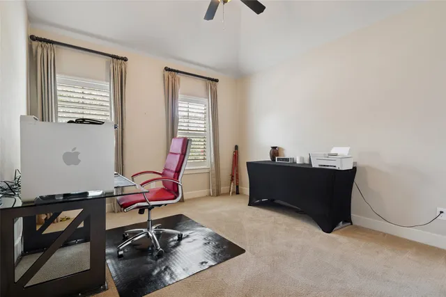 a room with furniture and air hockey table