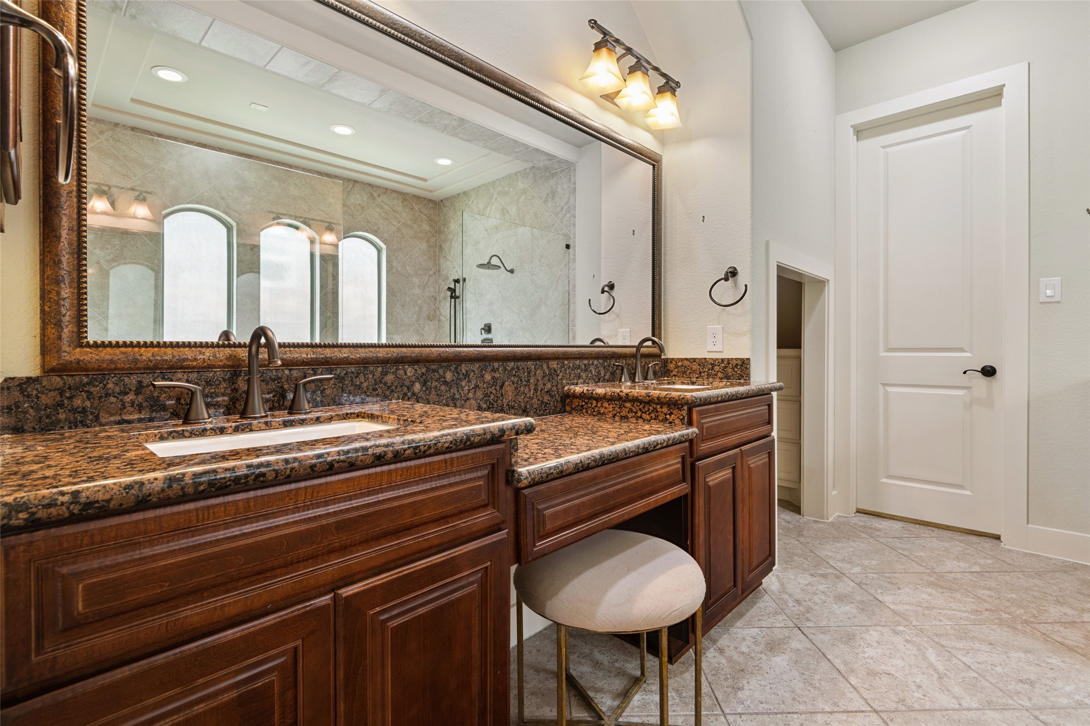 6510 Fraser Point Court Spring, TX 77379 - Photo 21 of 35 a view of a bathroom with a sink and a mirror