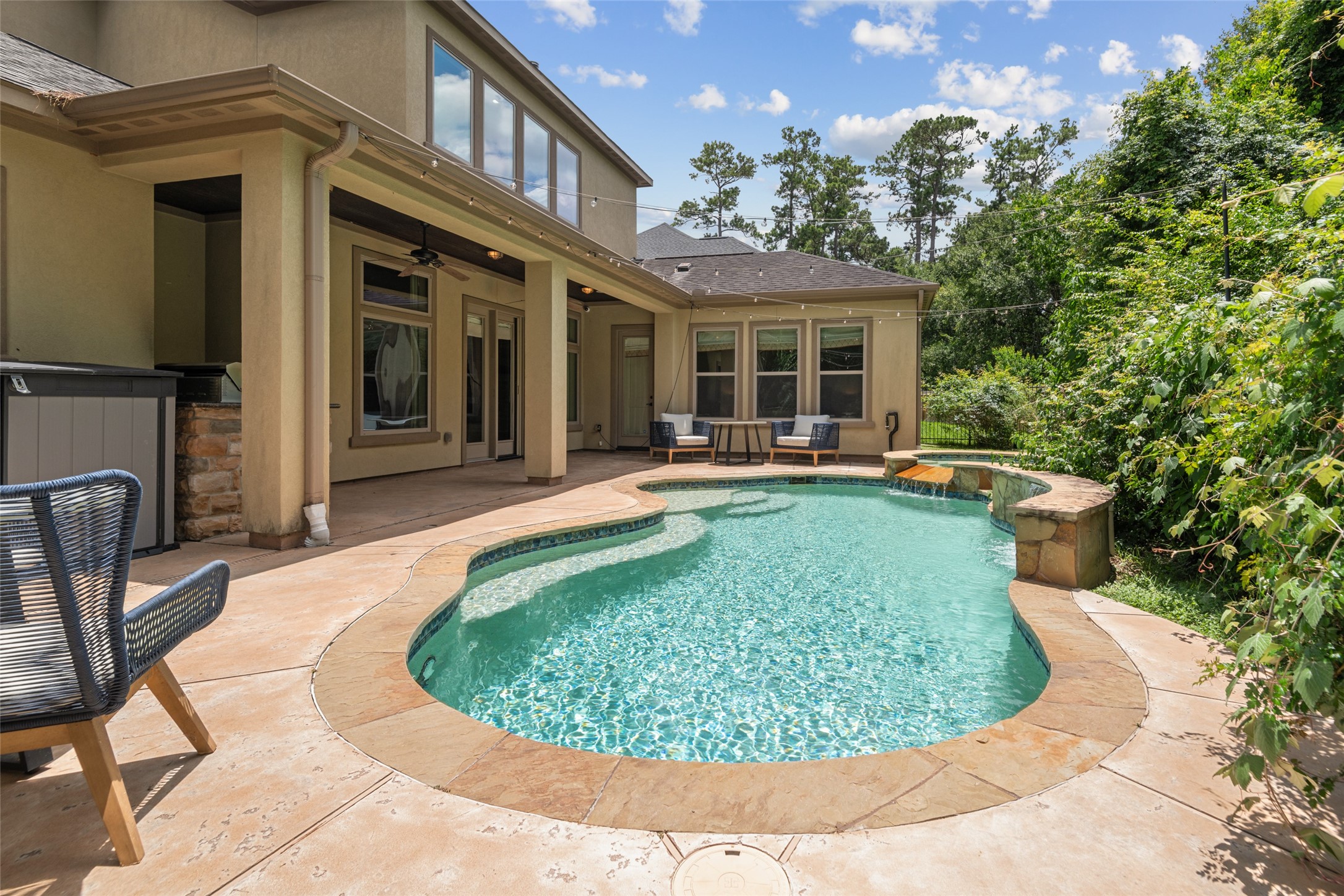 6510 Fraser Point Court Spring, TX 77379 - Photo 29 of 35 a view of a house with outdoor kitchen