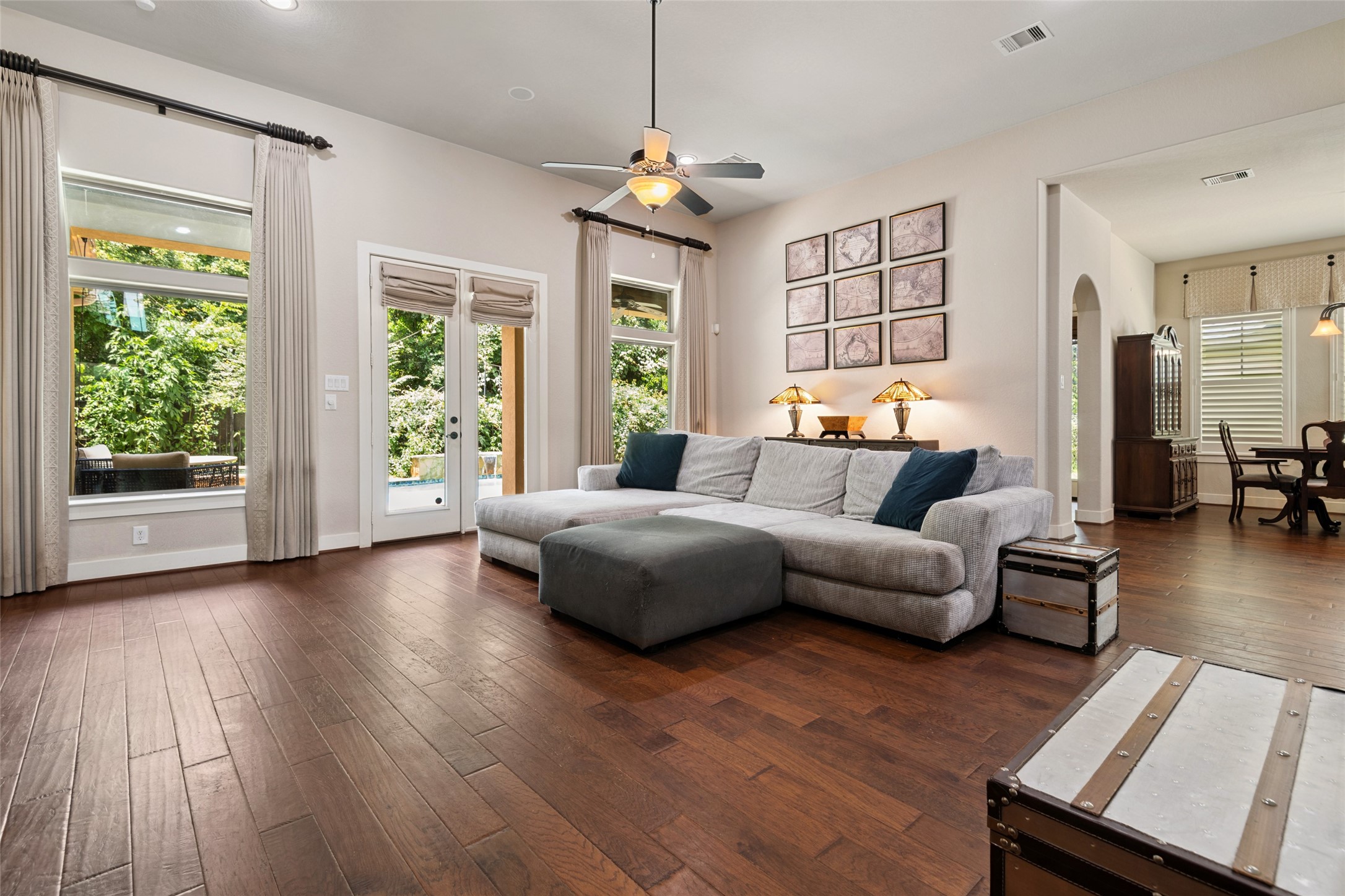 6510 Fraser Point Court Spring, TX 77379 - Photo 6 of 35 a spacious bedroom with wooden floors and a large window
