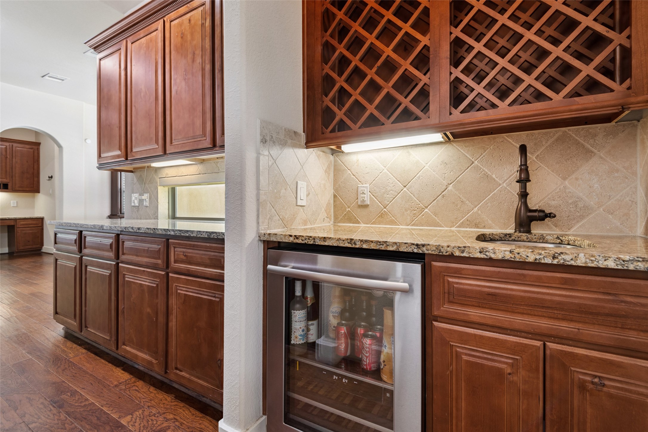 6510 Fraser Point Court Spring, TX 77379 - Photo 9 of 35 a kitchen with stainless steel appliances granite countertop a stove and a sink