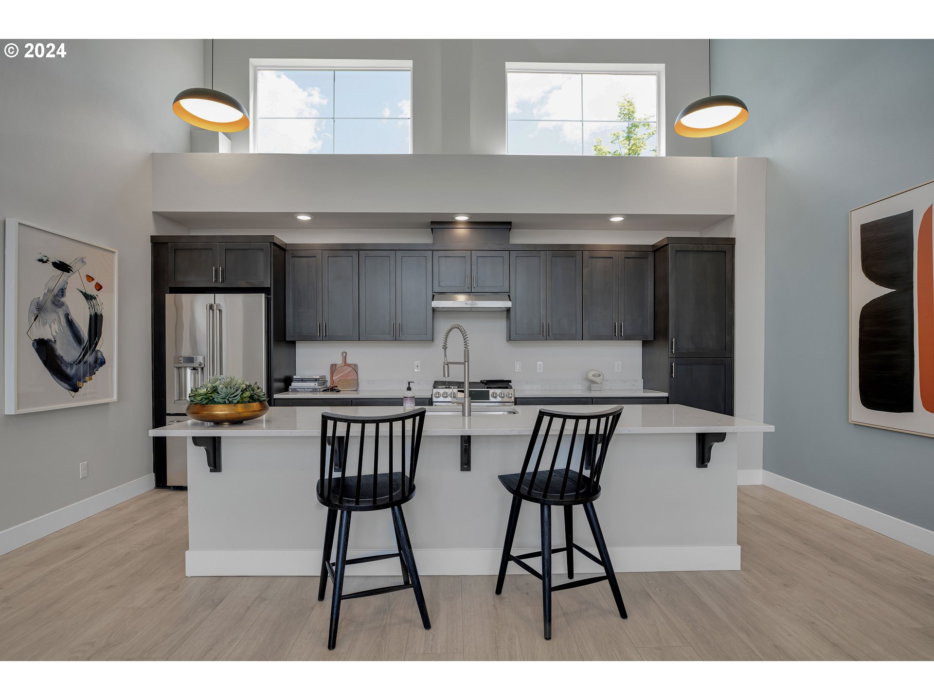 16937 Southwest Friendly Lane Beaverton, OR 97007 - Photo 38 of 44 a kitchen with a table and chairs