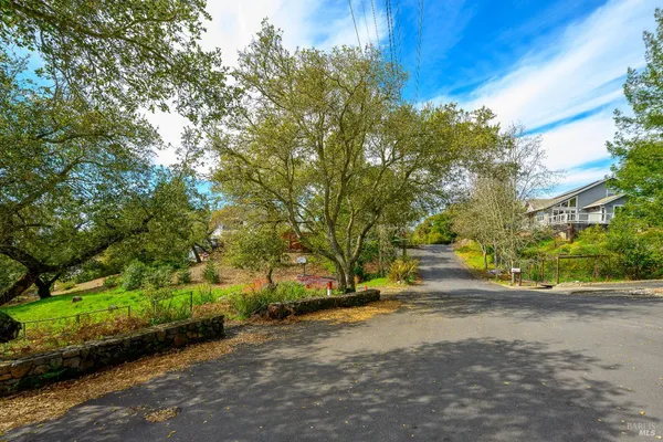 a view of a street with a building in front of it