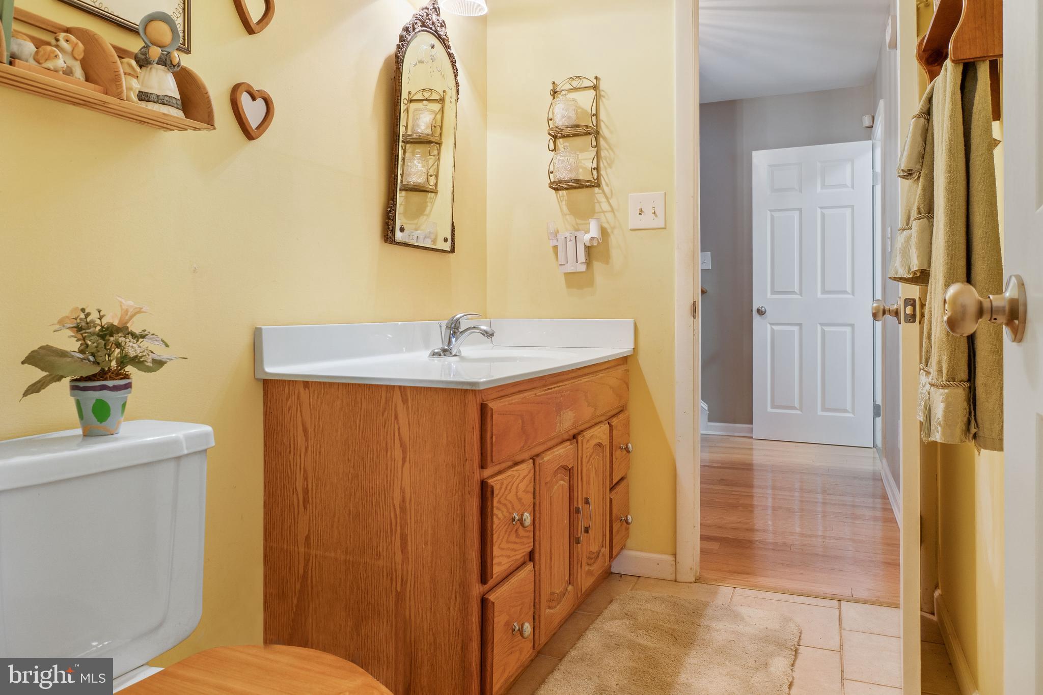 22 Peach Road Elkton, MD 21921 - Photo 15 of 24 a bathroom with a sink a toilet and shower