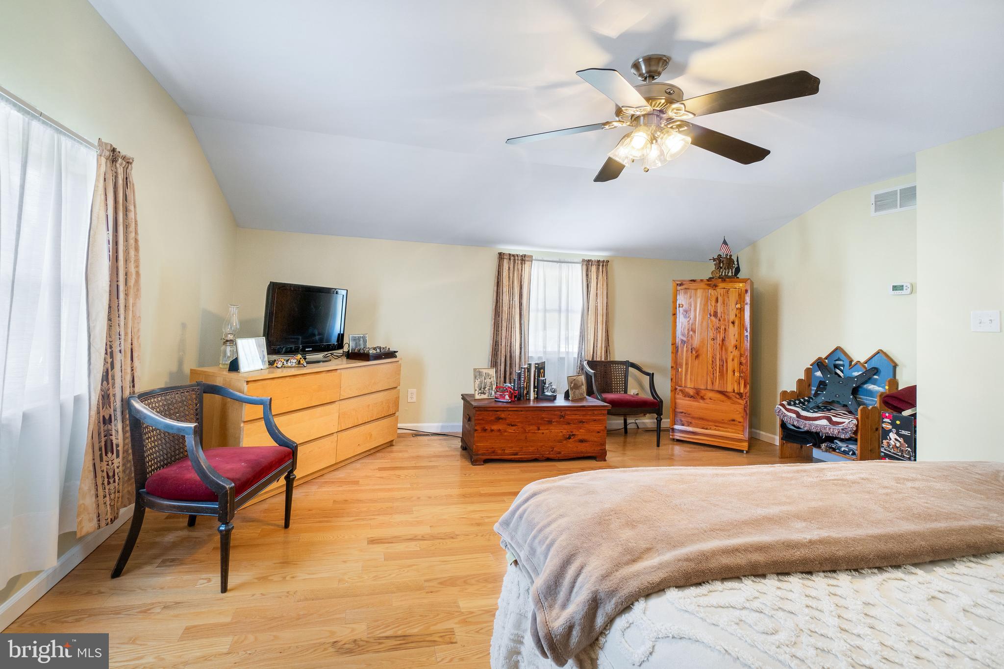 22 Peach Road Elkton, MD 21921 - Photo 19 of 24 a bedroom with furniture and a flat screen tv