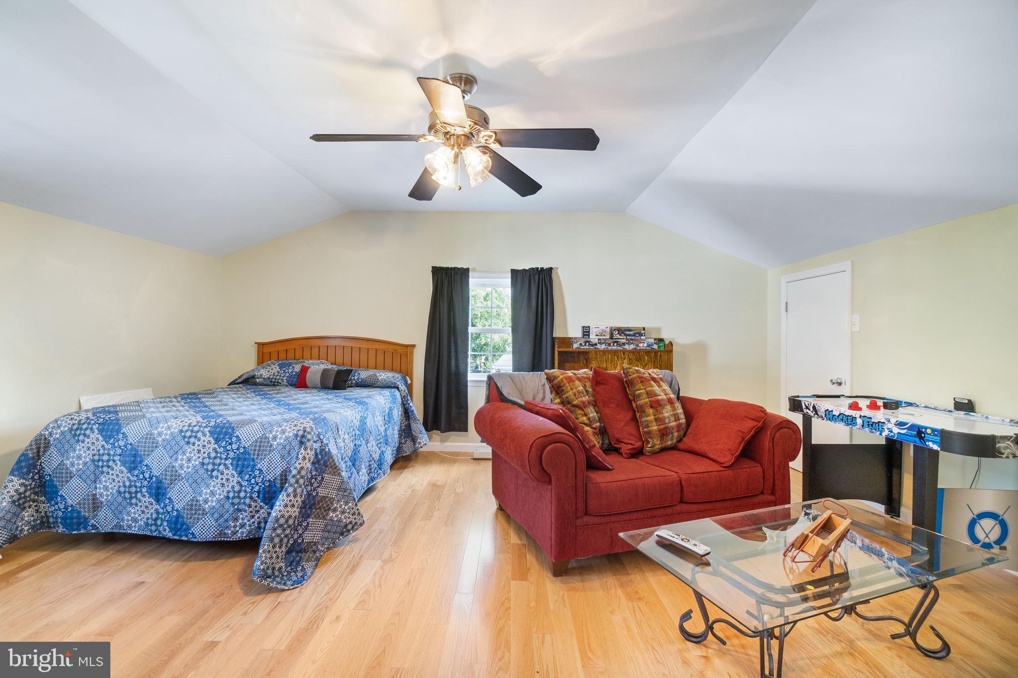 22 Peach Road Elkton, MD 21921 - Photo 20 of 24 a bedroom with furniture and wooden floor