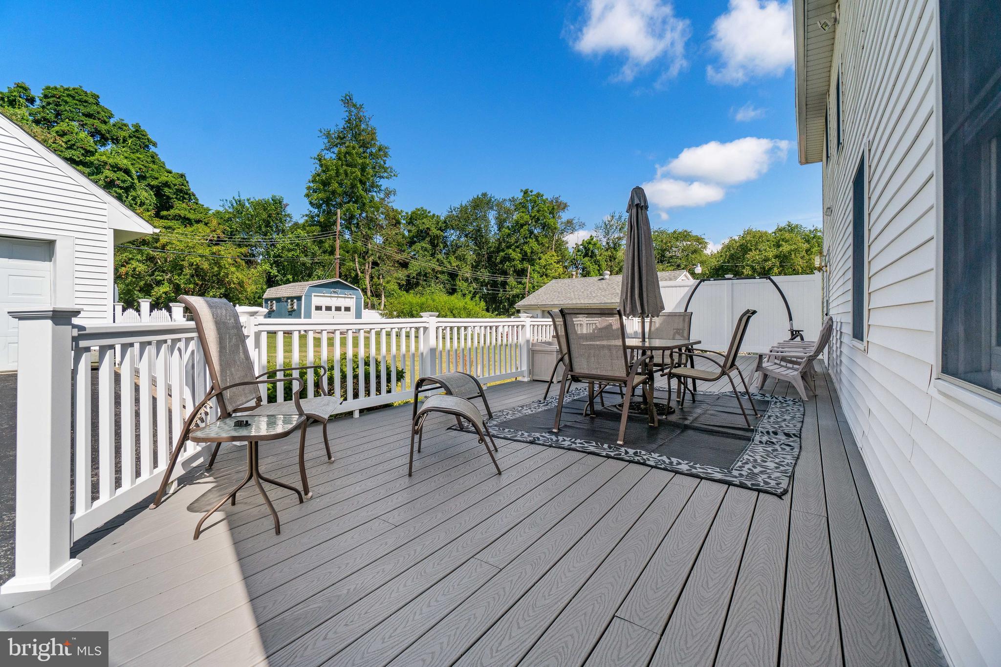 22 Peach Road Elkton, MD 21921 - Photo 3 of 24 a view of a chairs on deck and patio
