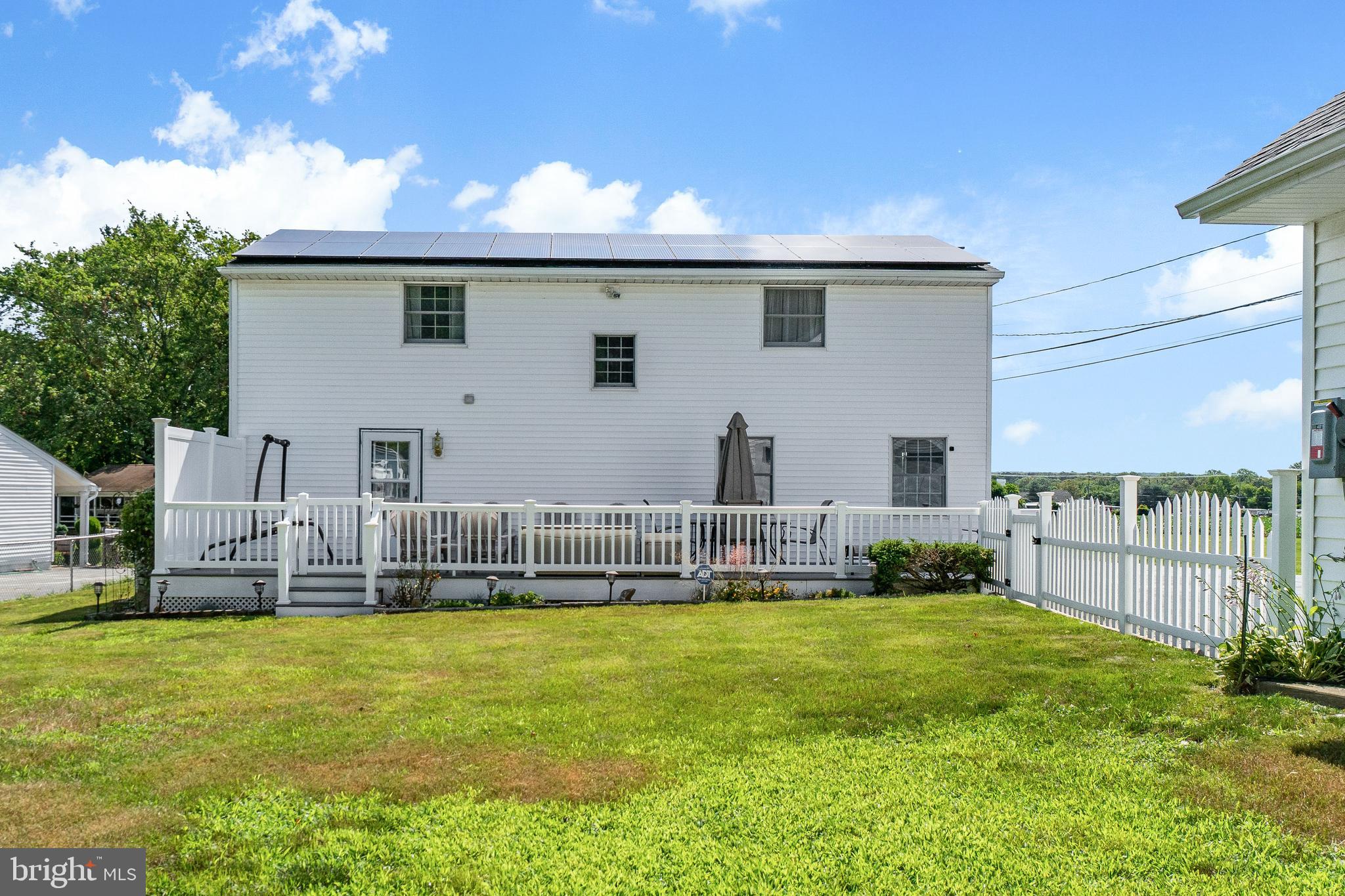 22 Peach Road Elkton, MD 21921 - Photo 5 of 24 a view of a house with a backyard