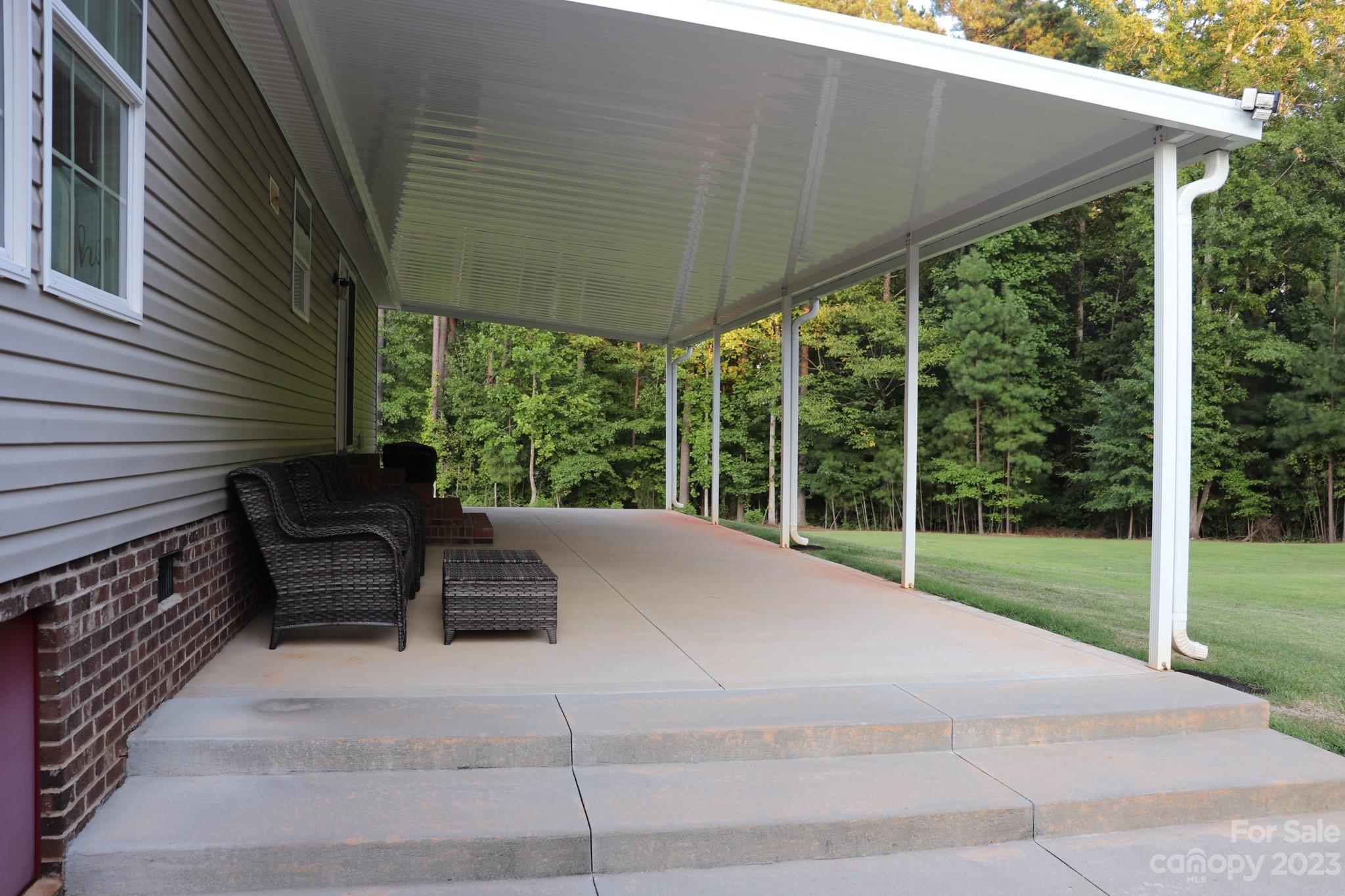 2380 Briggs Road Salisbury, NC 28147 - Photo 22 of 27 a house view with a garden space