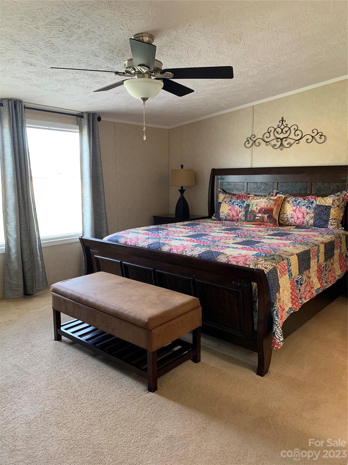 2380 Briggs Road Salisbury, NC 28147 - Photo 7 of 27 a bedroom with bed and window