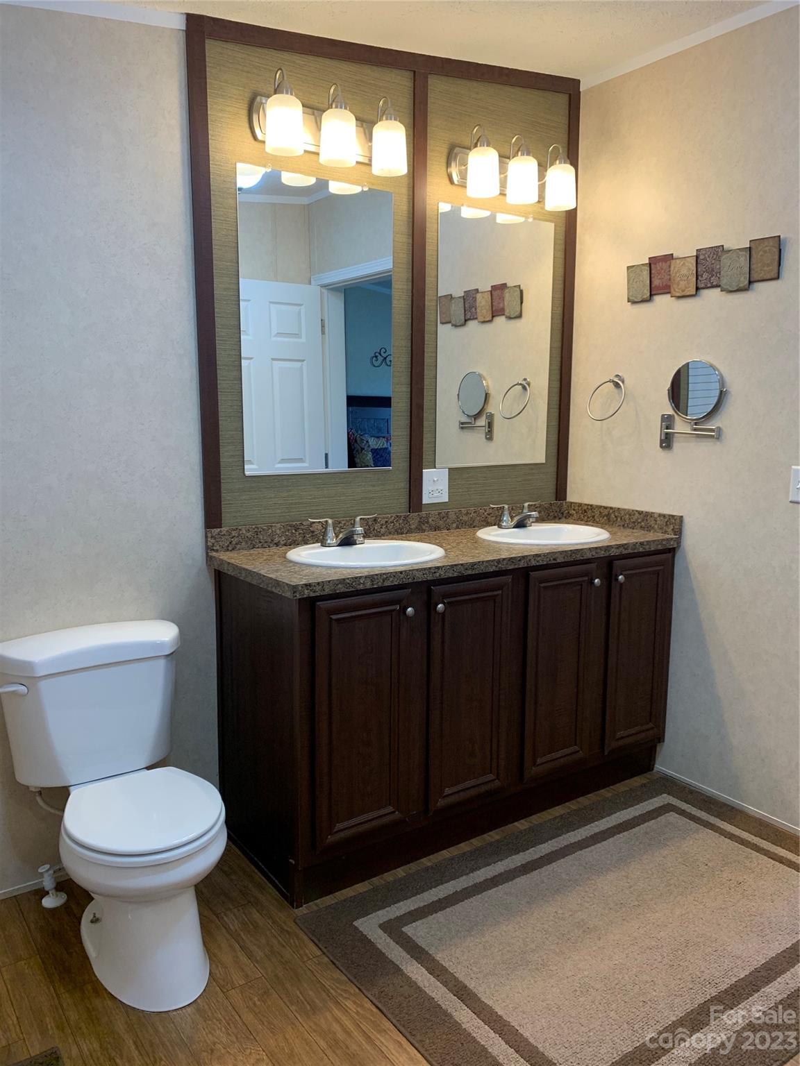 2380 Briggs Road Salisbury, NC 28147 - Photo 9 of 27 a bathroom with a sink and a mirror