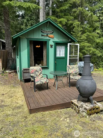 a front view of a house with seating space