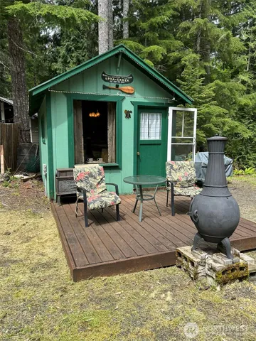 a front view of a house with seating space