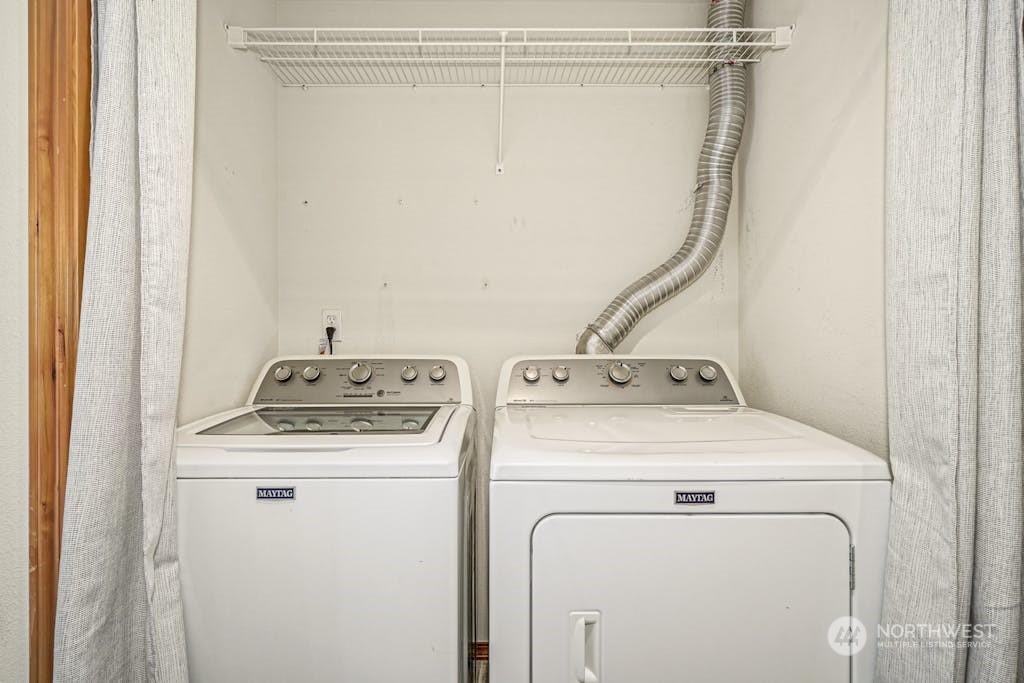 1009 112th Street Southeast, Unit E104 Everett, WA 98208 - Photo 19 of 24 a utility room with dryer and washer
