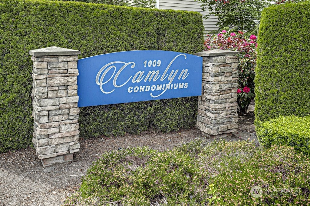 1009 112th Street Southeast, Unit E104 Everett, WA 98208 - Photo 24 of 24 a sign that is on the wall