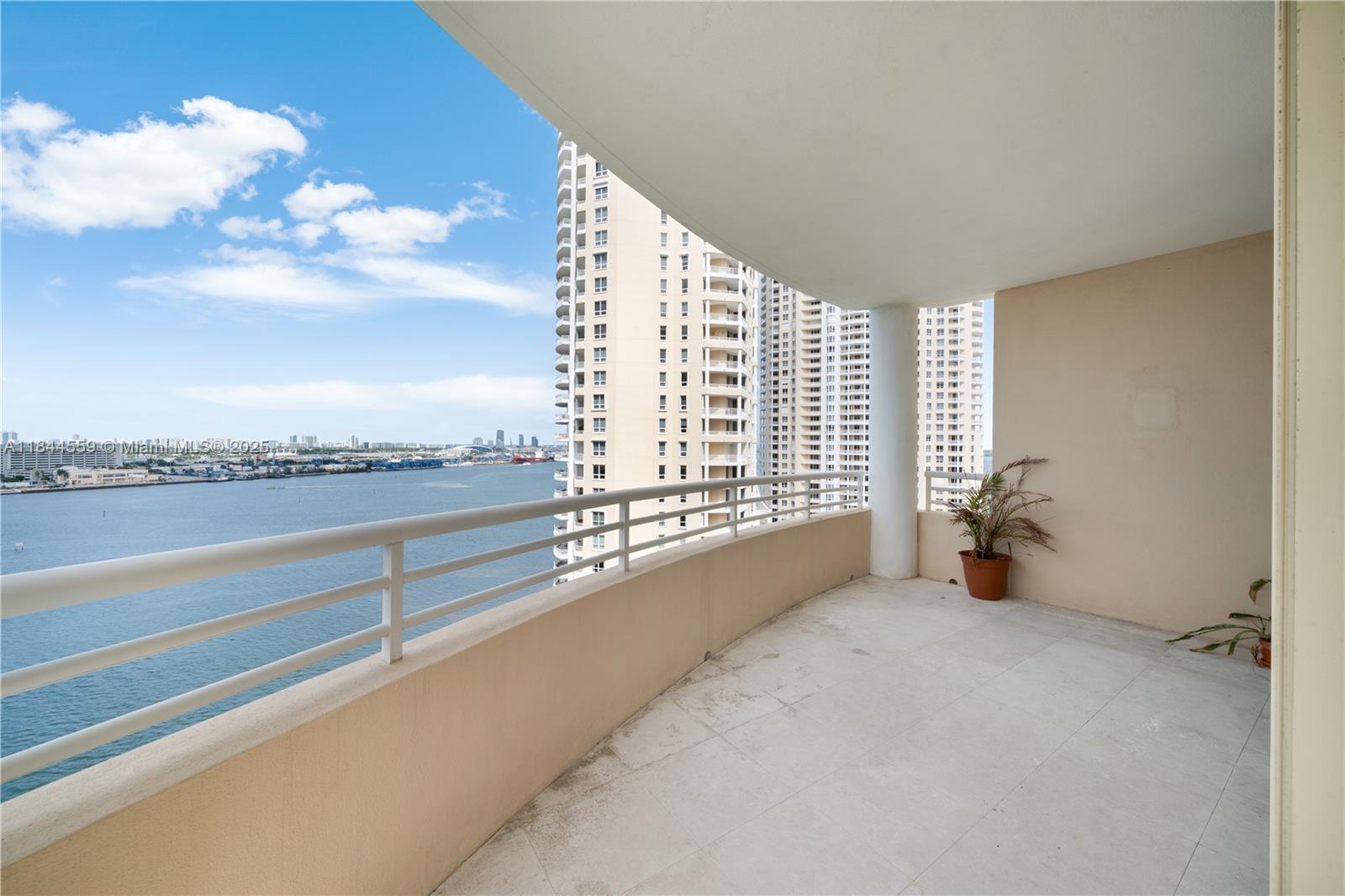 888 Brickell Key Drive, Unit 1912 Miami, FL 33131 - Photo 3 of 37 a view of an empty room with a window