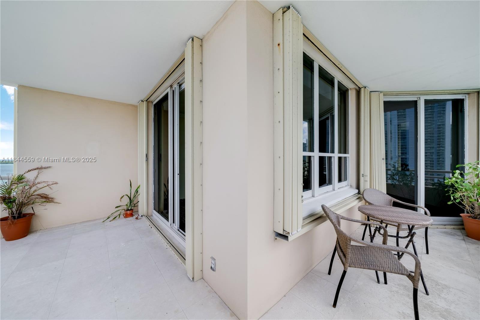 888 Brickell Key Drive, Unit 1912 Miami, FL 33131 - Photo 6 of 37 a view of a hallway with seating area