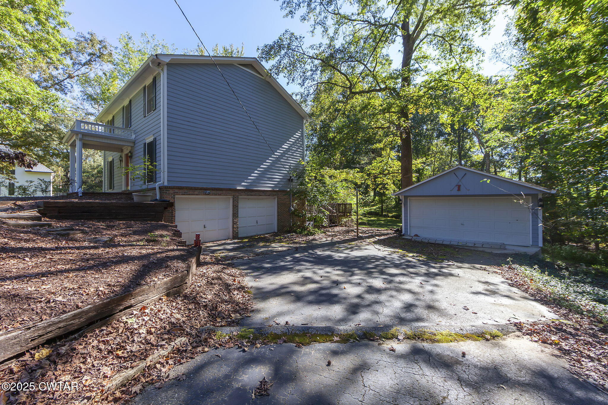 189 Valley Oak Loop Jackson, TN 38305 - Photo 20 of 22 a backyard of a house with lots of green space