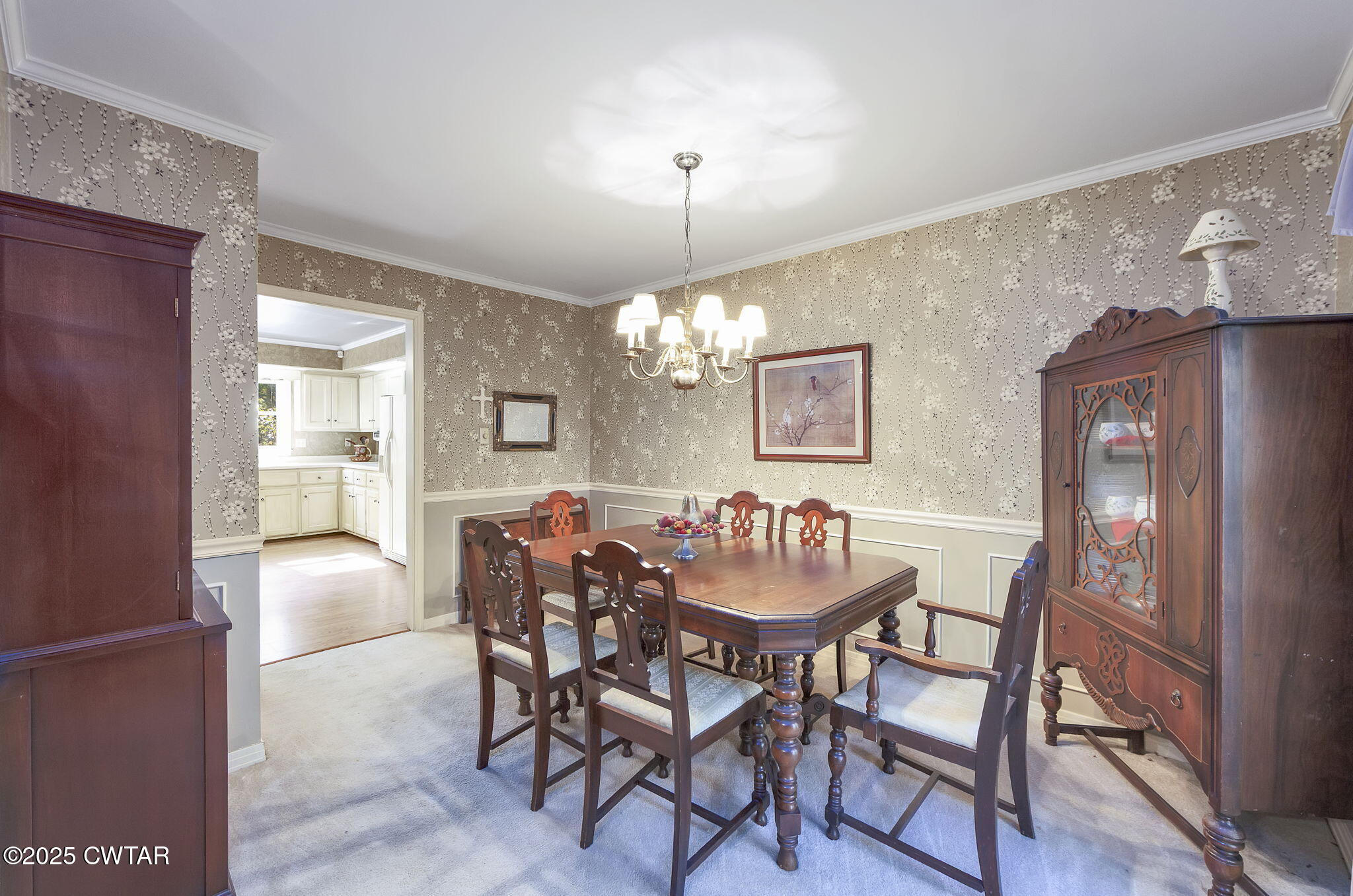 189 Valley Oak Loop Jackson, TN 38305 - Photo 2 of 22 a dining room with furniture and chandelier