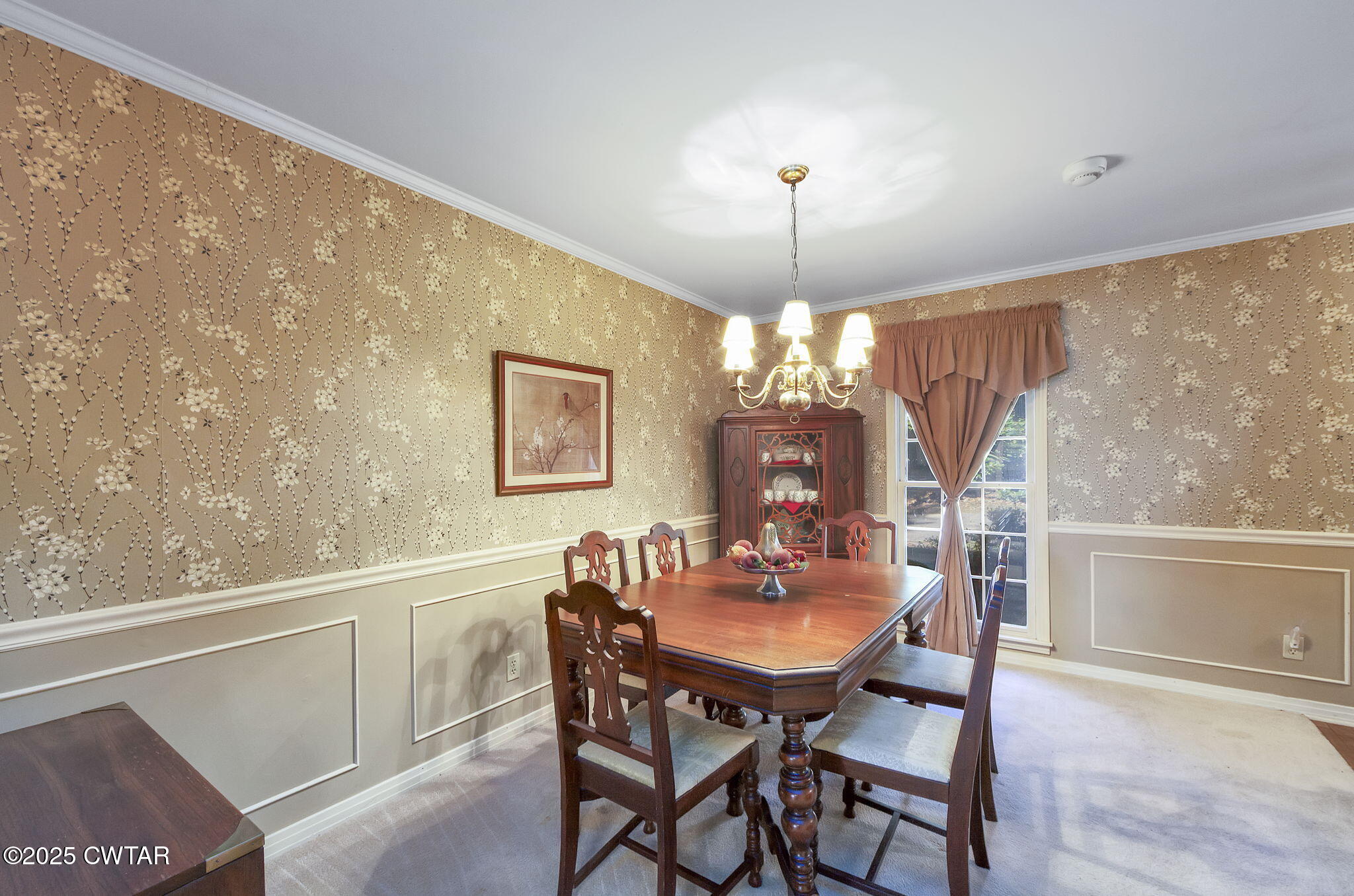 189 Valley Oak Loop Jackson, TN 38305 - Photo 3 of 22 a view of a dining room with furniture window and wooden floor