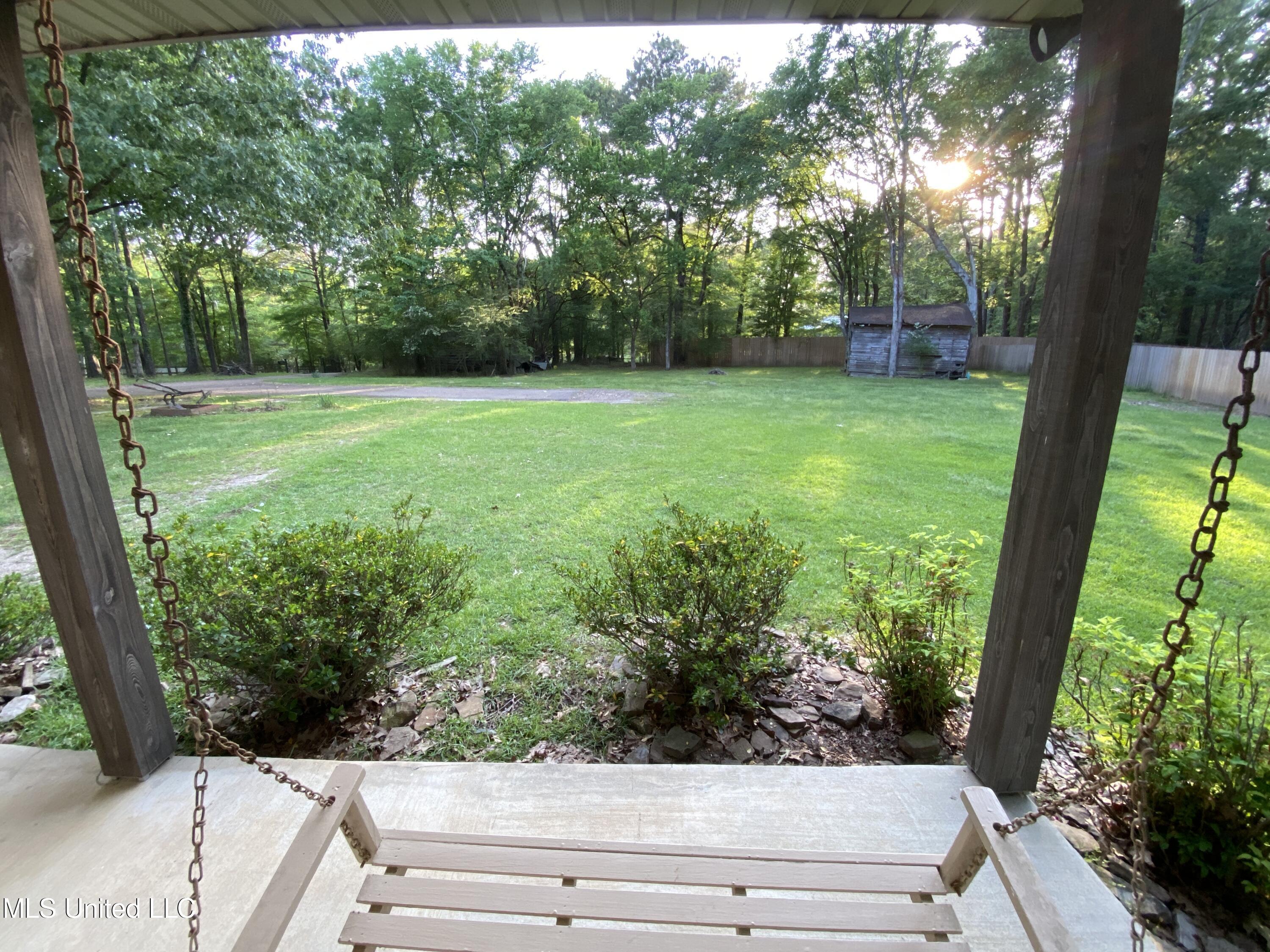 274 Pine Tree Lane Ridgeland, MS 39157 - Photo 7 of 48 274 Pine Tree porch swing view