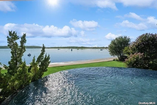 a view of a lake with a yard
