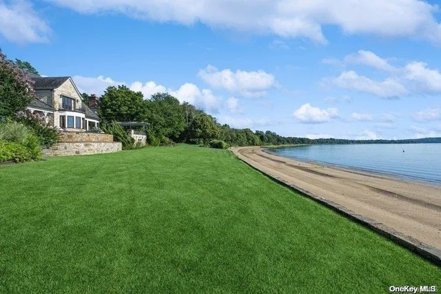 a view of a house with a big yard