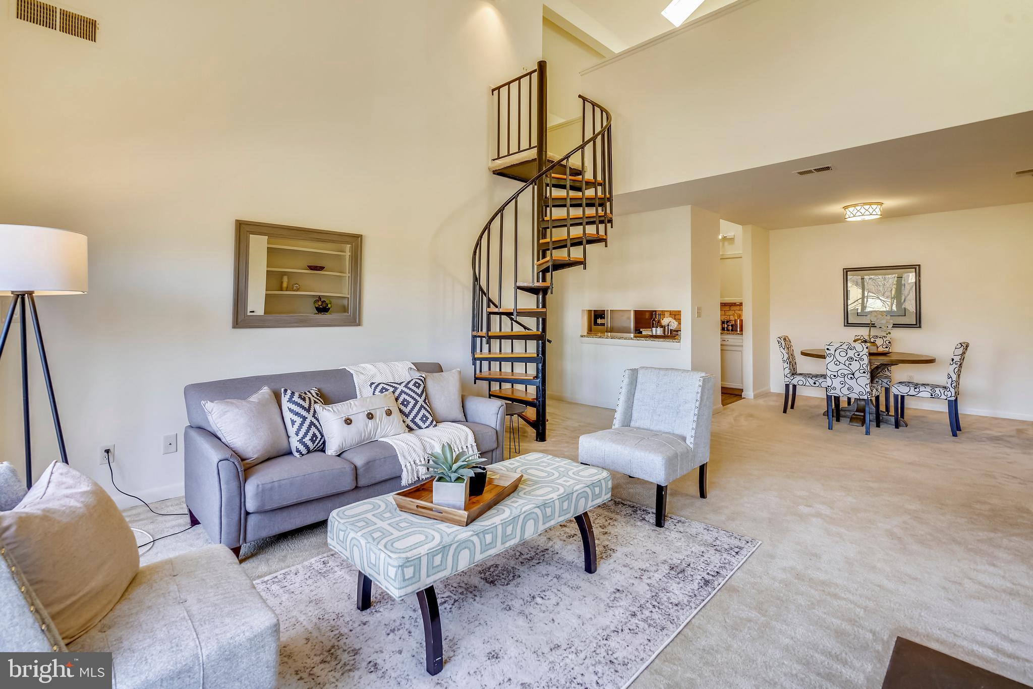 Spacious family room leading to open loft.