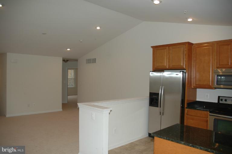 Kitchen & Living Room have cathedral ceiling.