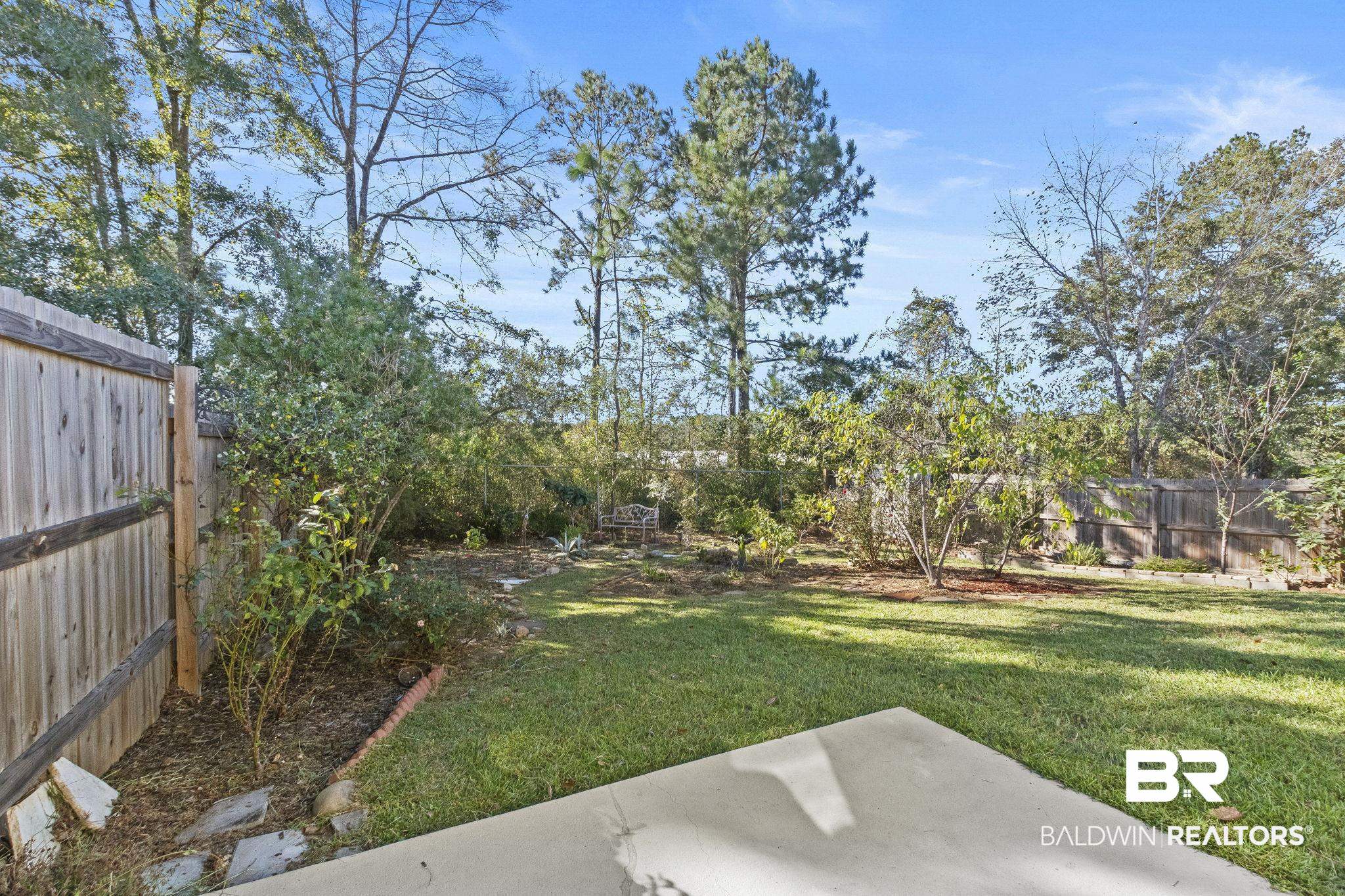 33156 Stables Drive, Unit 7B Daphne, AL 36527 - Photo 26 of 31 Fenced In Backyard