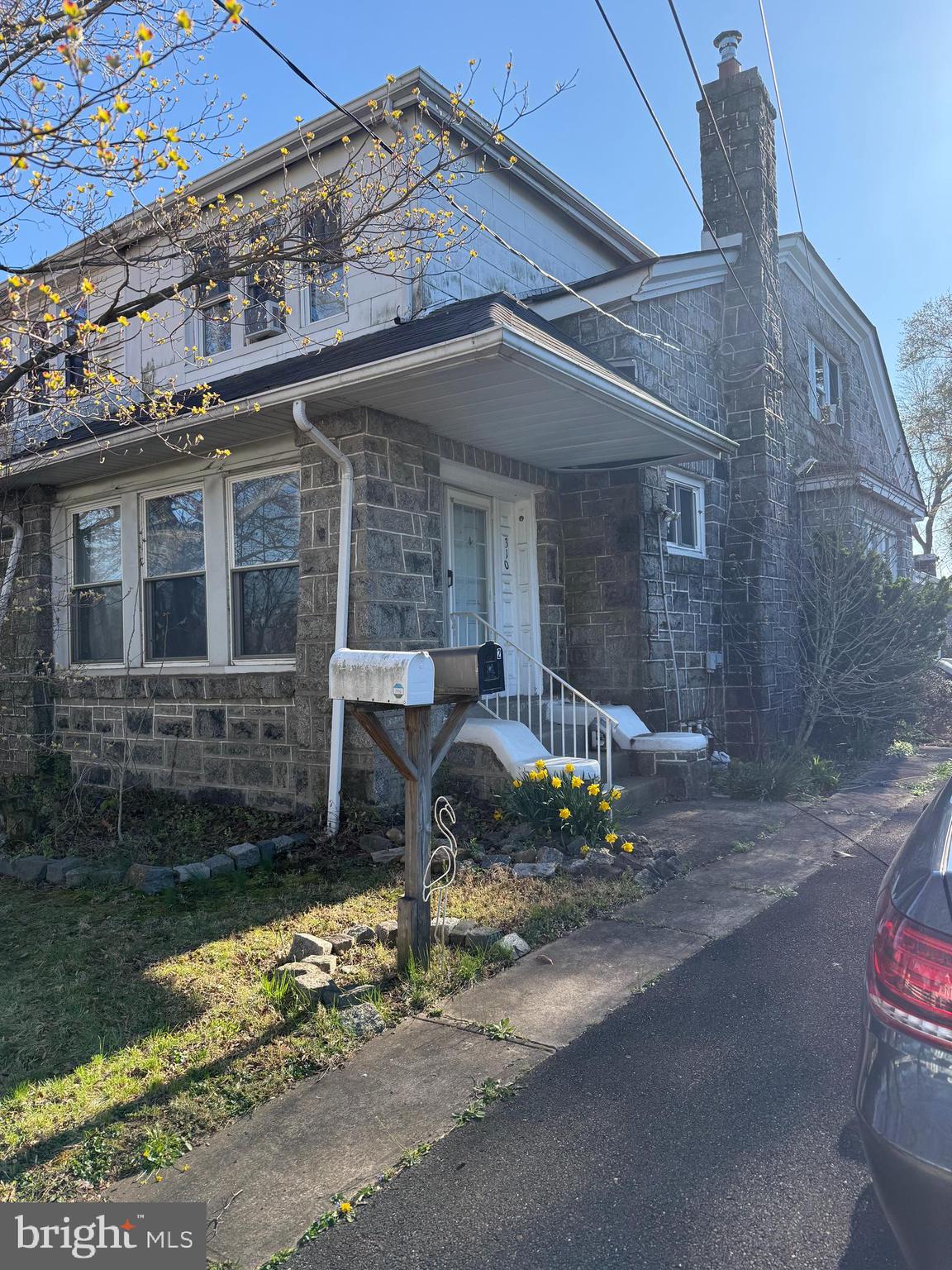 310 Wynnewood Avenue Croydon, PA 19021 - Photo 1 of 22 a front view of a house with parking area