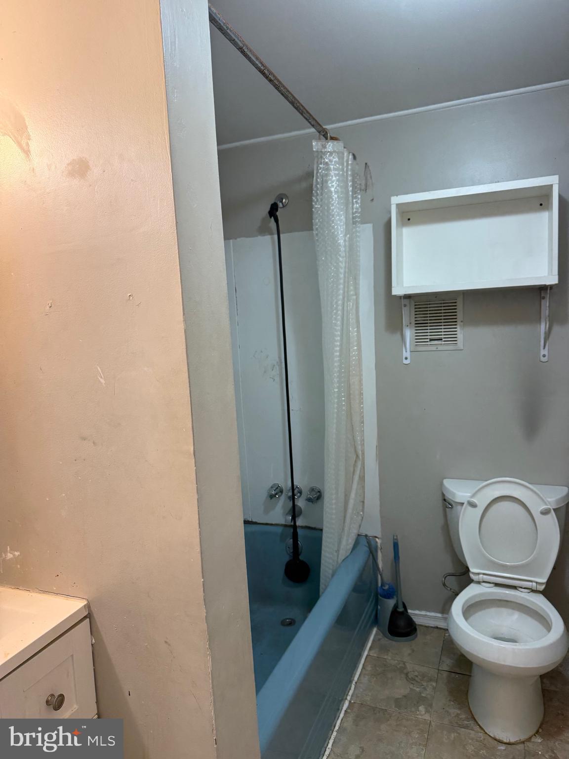 310 Wynnewood Avenue Croydon, PA 19021 - Photo 12 of 22 a bathroom with a toilet and a shower