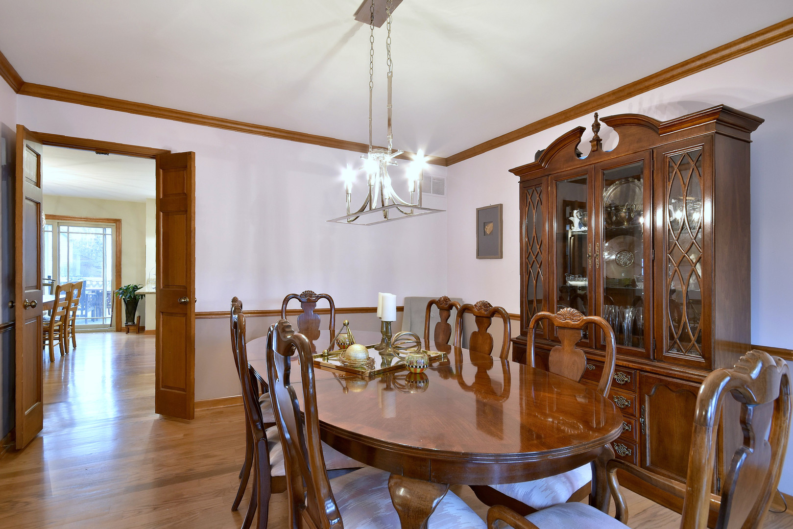 2535 Sun Valley Road Lisle, IL 60532 - Photo 11 of 54 a view of a dining room with furniture and wooden floor
