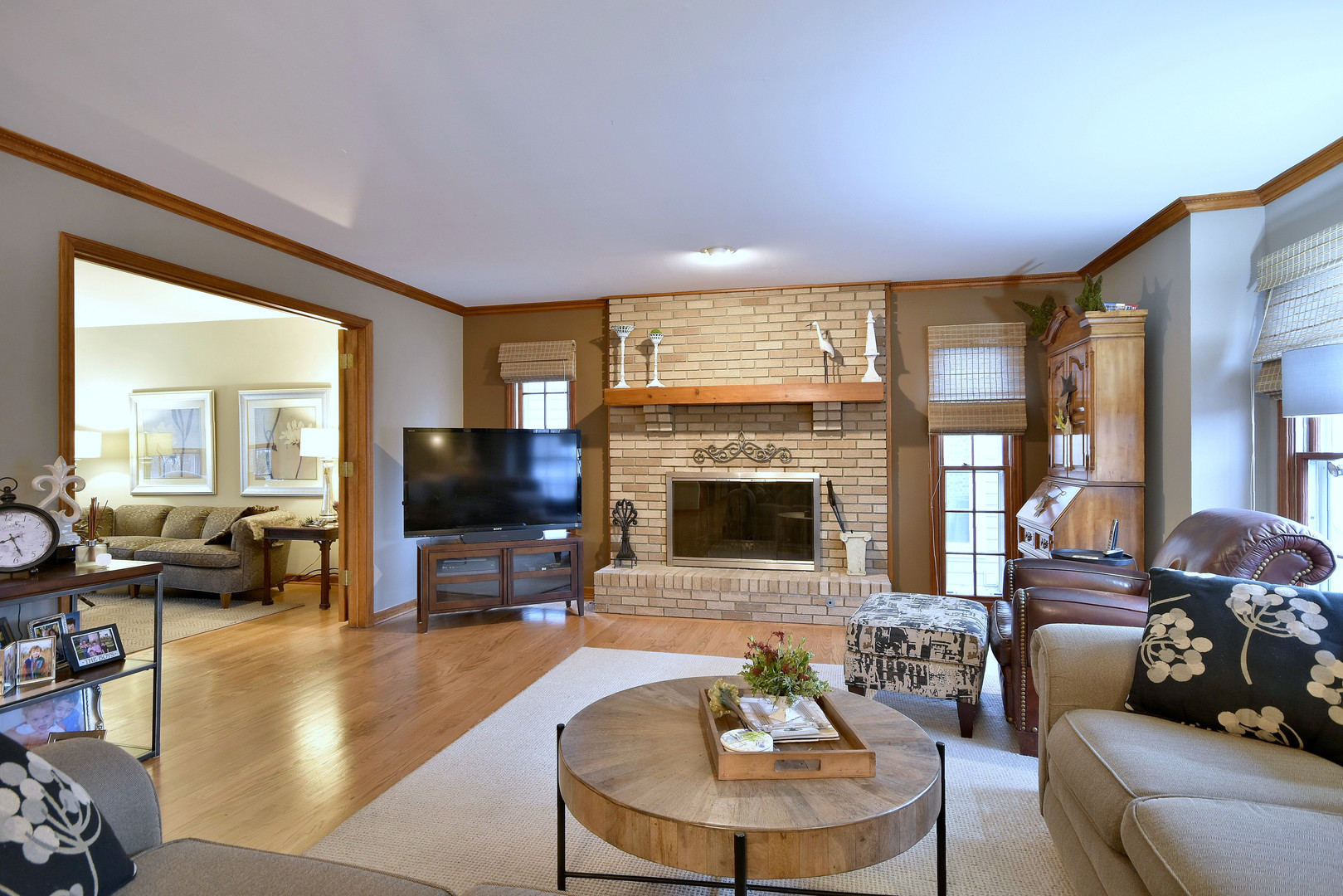 2535 Sun Valley Road Lisle, IL 60532 - Photo 14 of 54 a living room with fireplace furniture and a flat screen tv