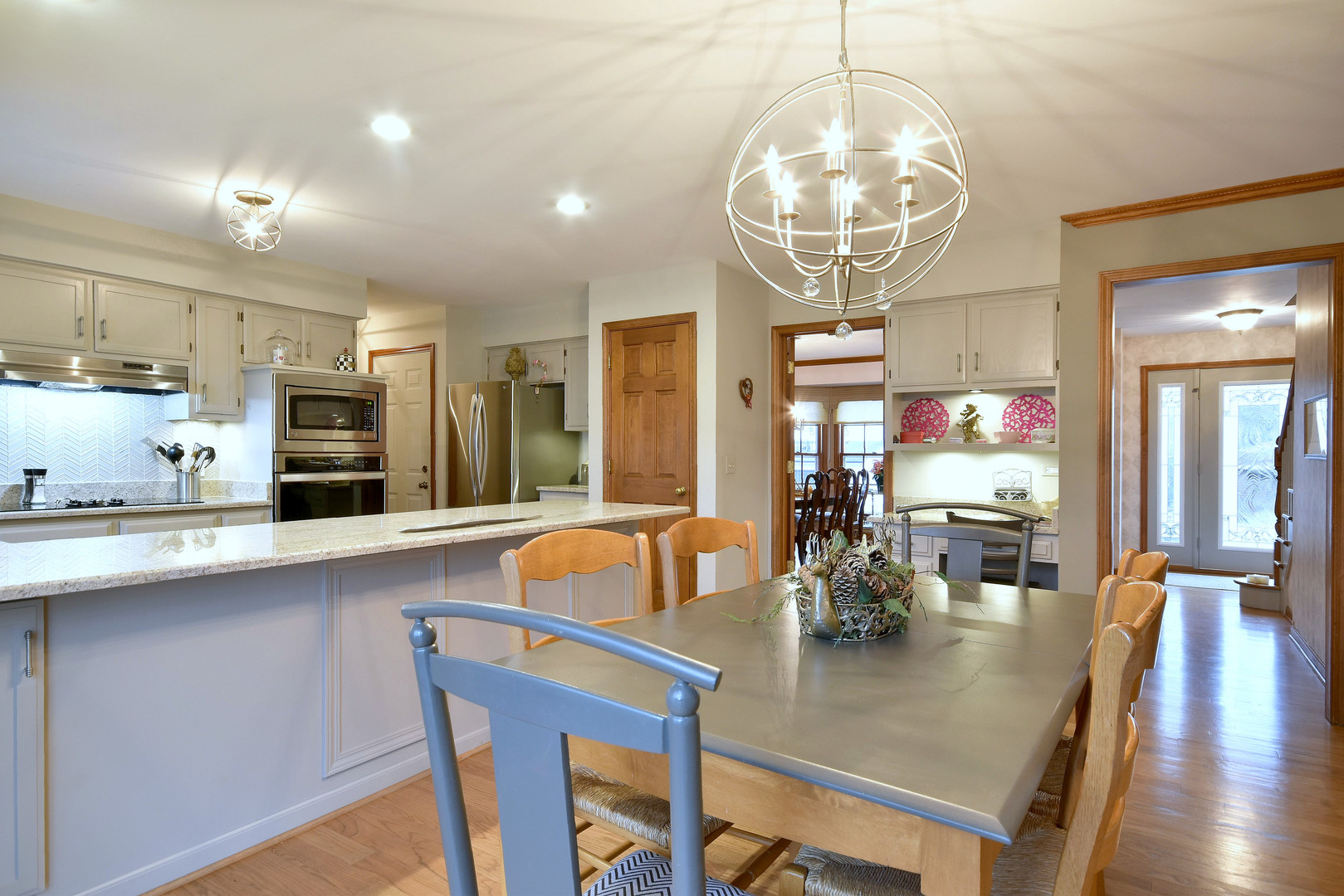 2535 Sun Valley Road Lisle, IL 60532 - Photo 18 of 54 a view of a dining room with furniture and wooden floor