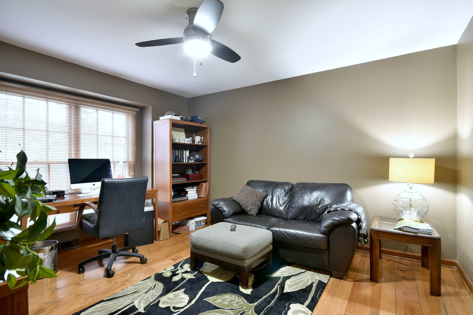 2535 Sun Valley Road Lisle, IL 60532 - Photo 25 of 54 a view of a livingroom with workspace and a couch