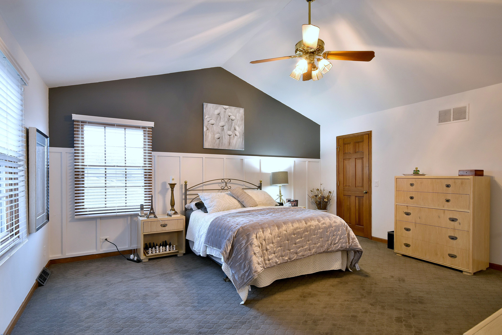 2535 Sun Valley Road Lisle, IL 60532 - Photo 27 of 54 a bedroom with a bed a chandelier and a dresser