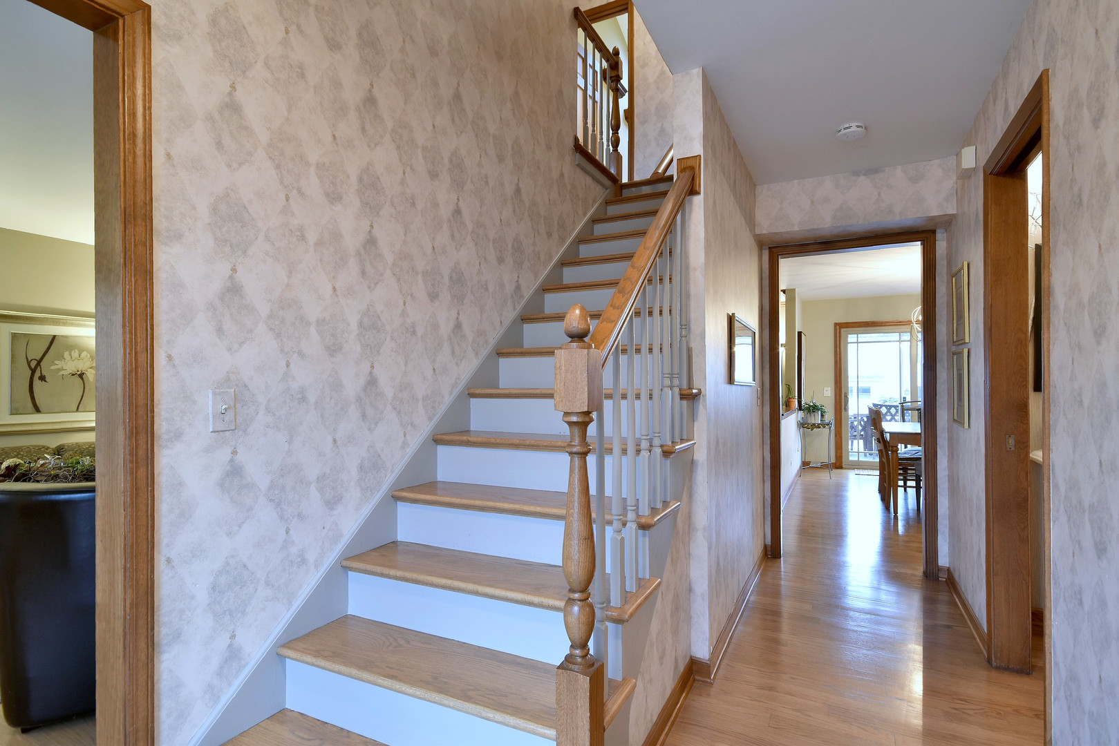 2535 Sun Valley Road Lisle, IL 60532 - Photo 3 of 54 a view of staircase with white walls and stairs