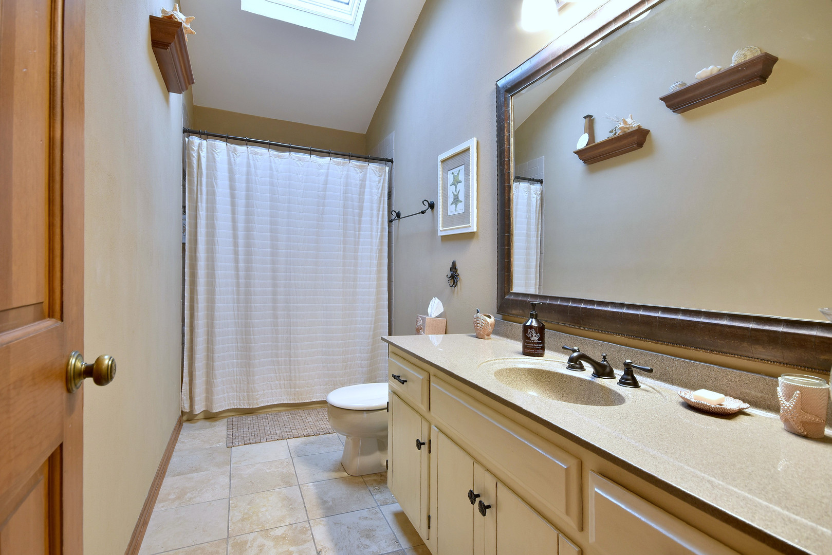 2535 Sun Valley Road Lisle, IL 60532 - Photo 36 of 54 a bathroom with a sink and mirror with toilet
