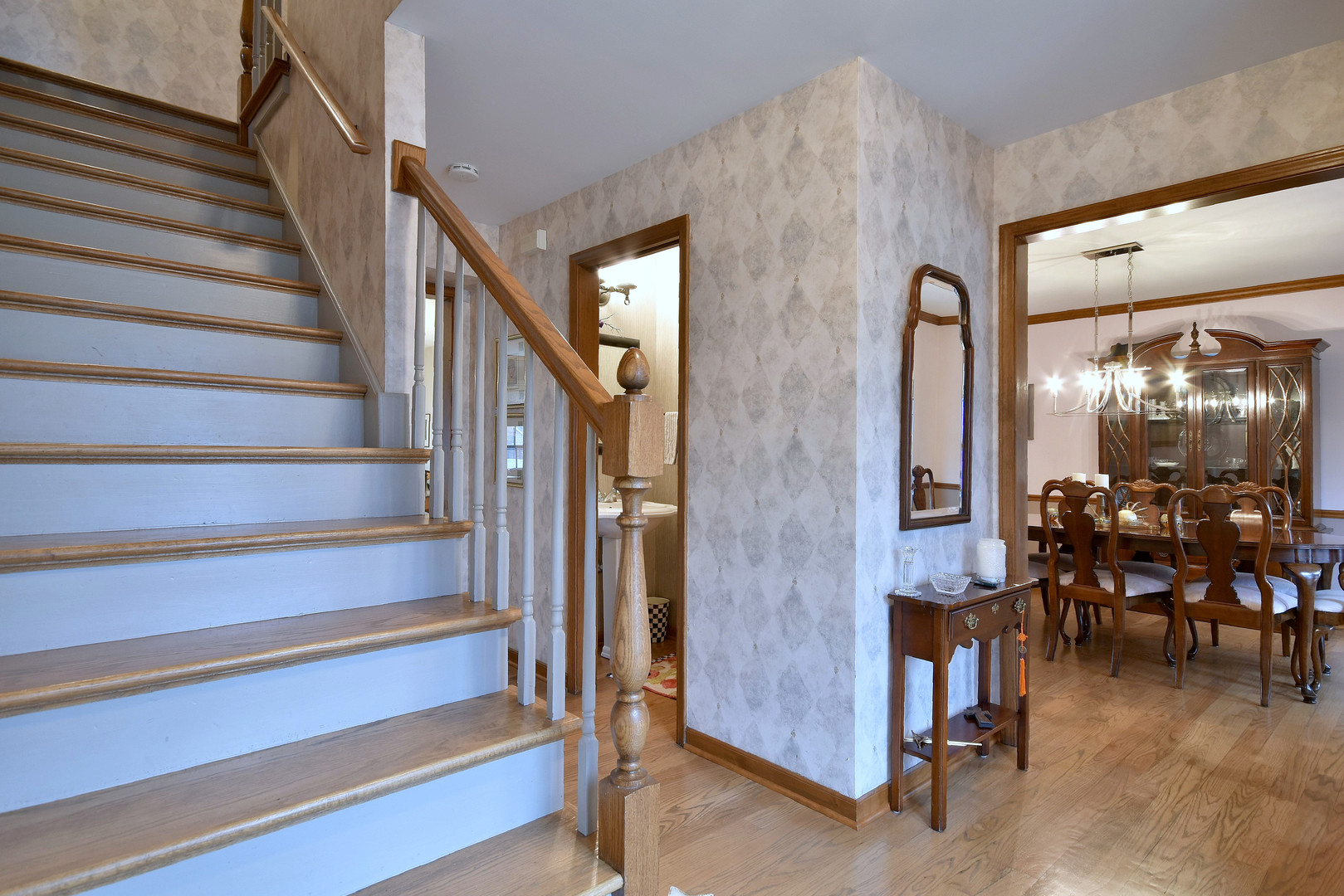 2535 Sun Valley Road Lisle, IL 60532 - Photo 4 of 54 a view of entryway livingroom and hall with wooden floor