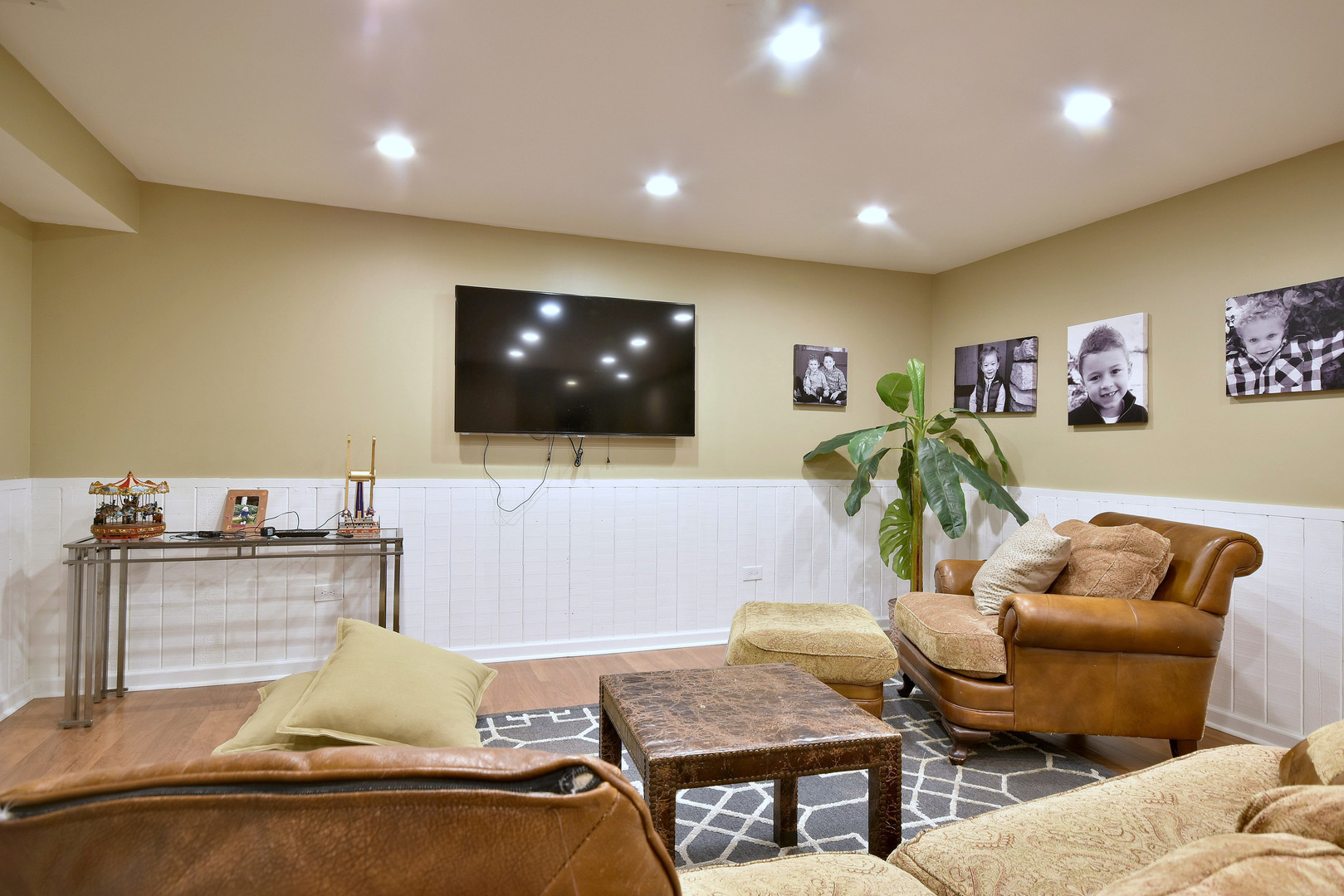 2535 Sun Valley Road Lisle, IL 60532 - Photo 43 of 54 a living room with furniture and a flat screen tv
