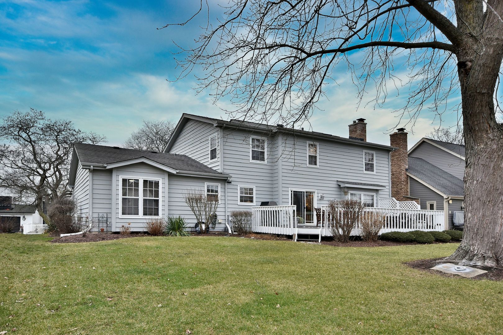 2535 Sun Valley Road Lisle, IL 60532 - Photo 50 of 54 a front view of a house with a garden
