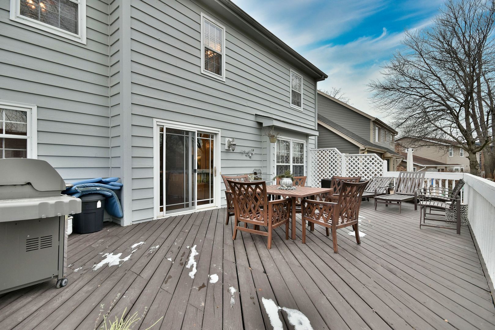 2535 Sun Valley Road Lisle, IL 60532 - Photo 52 of 54 a view of a house with a patio and wooden flooring