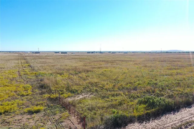a view of an ocean and mountain